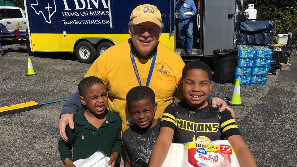 joe with kids after nashville tornadoes disaster relief effort