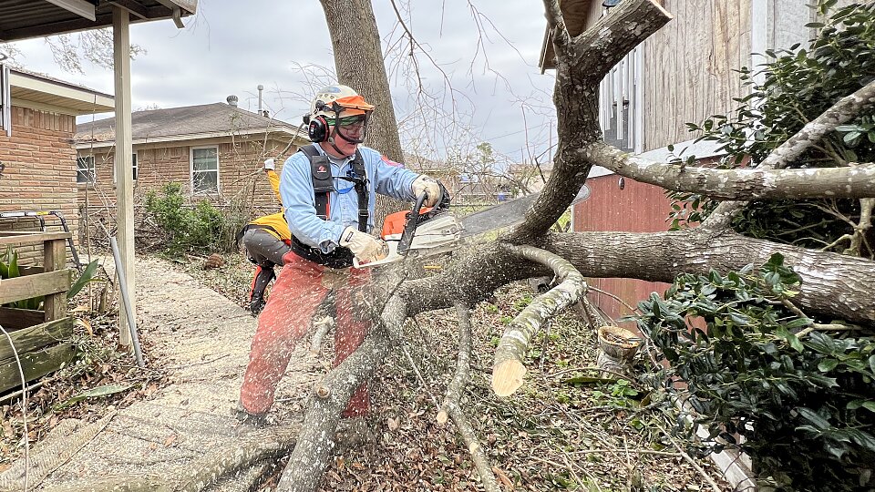 tbm disaster relief cut fallen trees after the houston tornado